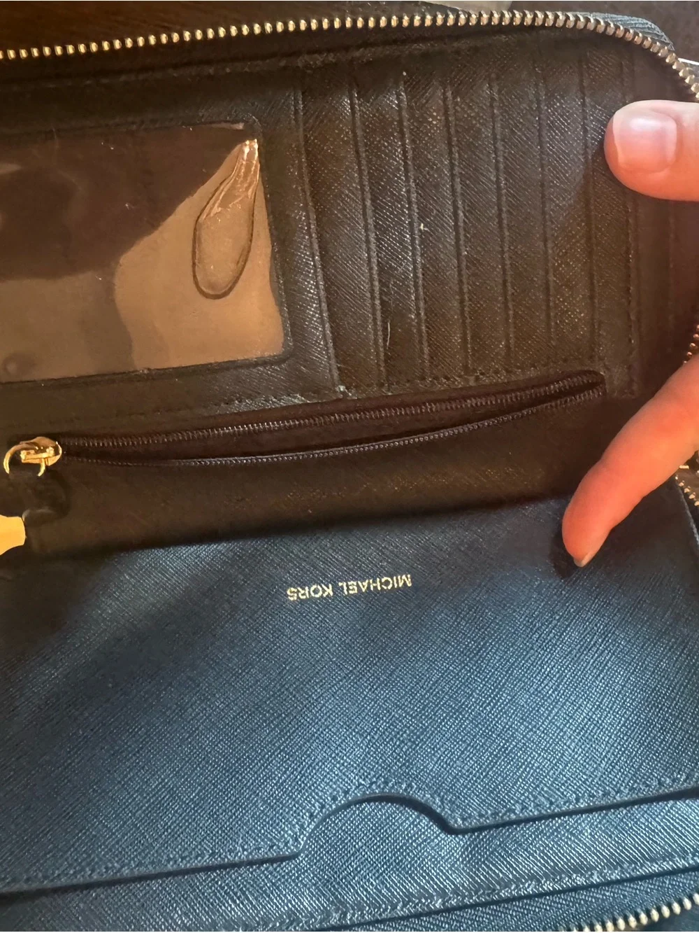 Michael Kors Black Perforated Wristlet Phone Case with Gold Logo